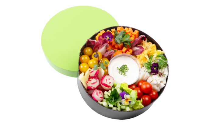 La boite de légumes et sauce aux herbes